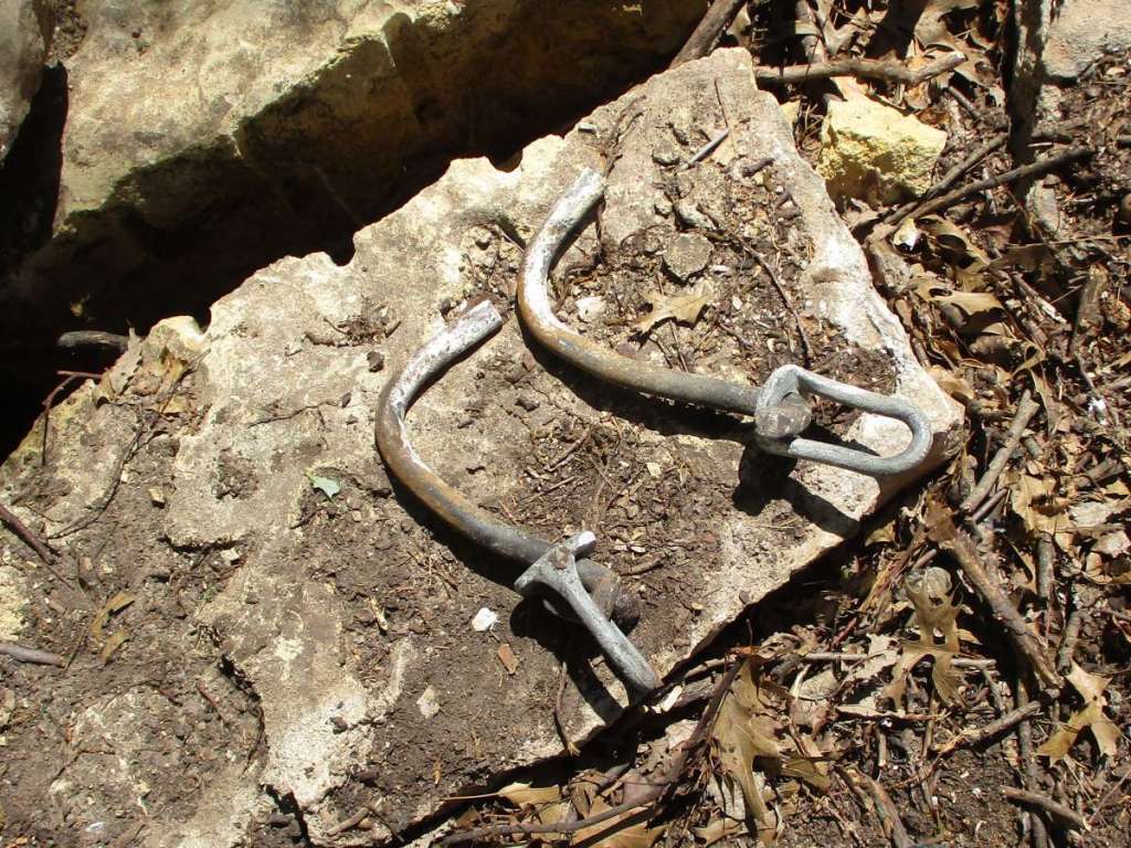 Metal spikes for moving stones